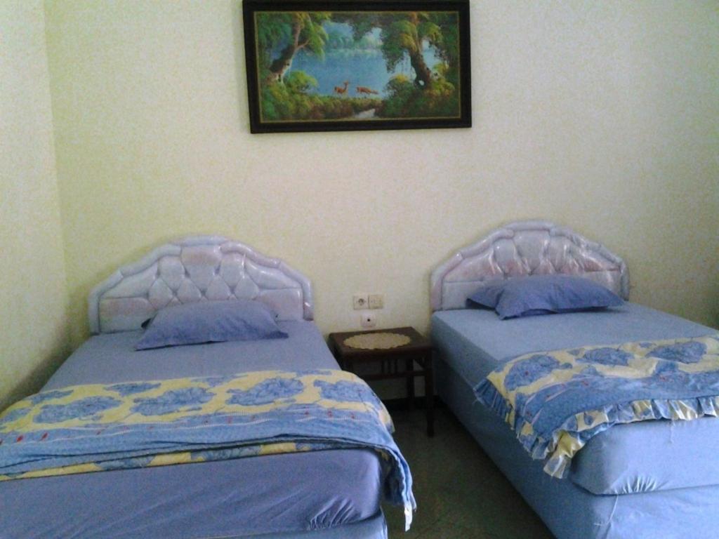 Hotel Wisma Djaja Syariah Bojonegoro Rum bild